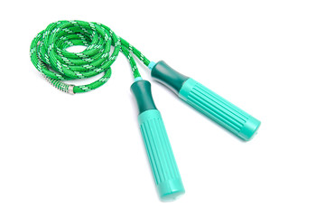 Green skipping rope for an exercise, isolated on white background