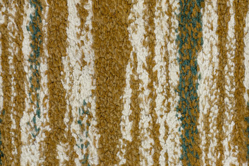 colorful texture made of colorful vertical stripes containing a mosaic of interwoven wool fibers zoom on full frame