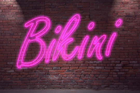 Leuchtreklame Bikini an Ziegelsteinmauer