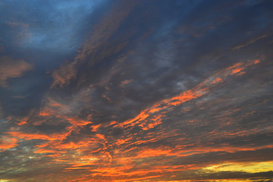 Fototapeta look at the beautifully colored clouds at sunrise