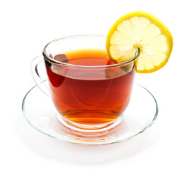 Isolated transparent cup of tea with lemon slice