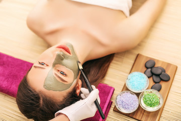 Obraz na płótnie Canvas Spa Mask. Woman in Spa Salon. Face Mask. Facial Clay Mask.