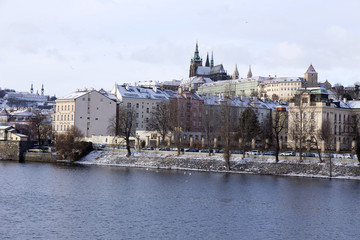 Snowy freeze Prague Lesser Town with gothic Castle, Czech republic