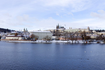 Snowy freeze Prague Lesser Town with gothic Castle, Czech republic