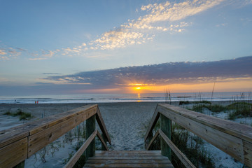 Fototapeta premium Sunrise on the Beach from Walkway