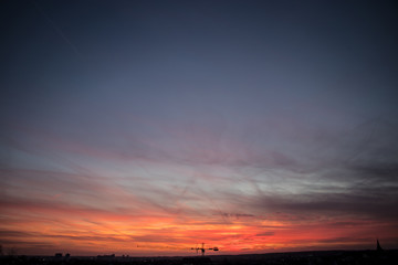 Red sunset with blue background