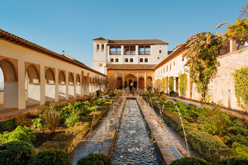 Fototapeta na wymiar Courtyard and fountains of Generalife palace in Alhambra, Granada 