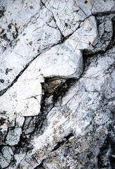 limestone rock with a zigzag crack