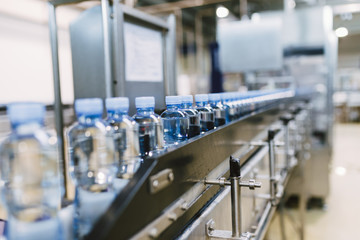 Fototapeta premium Water factory - Water bottling line for processing and bottling pure mineral carbonated water into bottles. 
