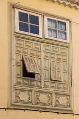 Old wooden window on building facade