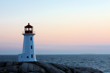 Fototapeta na wymiar Peggys Cove Lighthouse After Sunset, Nova Scotia, Canada
