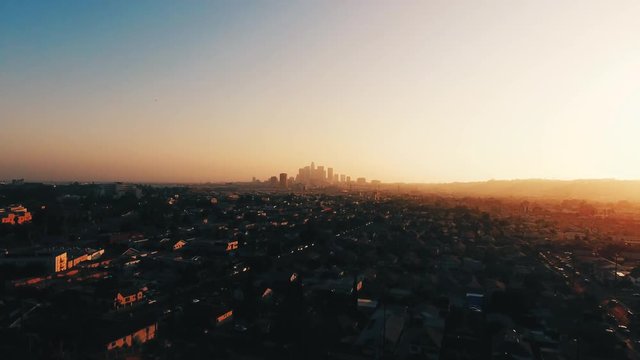 Aerial, California city skyline at sunset