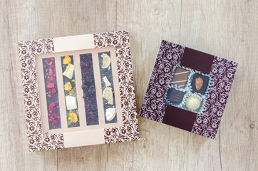 Sweet box of chocolates on wood table