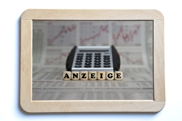 advertisement word built with letter cubes