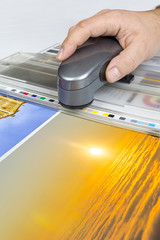 Offset print controll. Spectrophotometer measurement of CMYK color stripe, vertical