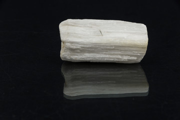 Cryolite on black background from personal collection of Semi-precious stones and minerals