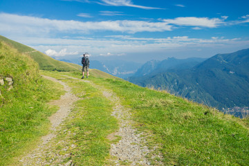 Hiking on peaks of Italian mountains with beautiful view to the lake Como