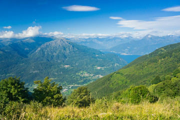 Hiking on peaks of Italian mountains with beautiful view to the lake Como