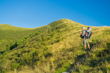 Hiking on peaks of Italian mountains with beautiful view to the lake Como