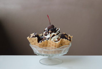 Ice Cream Sundae in an edible waffle bowl with brownies, almonds