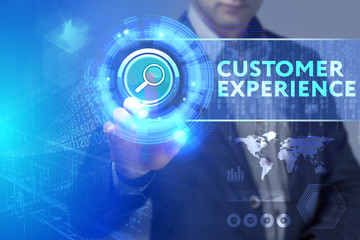Business, Technology, Internet and network concept. Business man working on the tablet of the future, select on the virtual display: Customer experience
