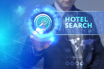 Business, Technology, Internet and network concept. Business man working on the tablet of the future, select on the virtual display: Hotel search