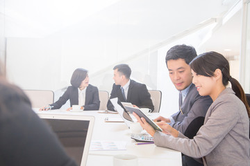 Business meeting with small group project discussion 