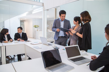 Business meeting with small group project discussion 