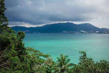 Obraz premium Picturesque view to the lagoon. A beautiful lagoon under the cloudy sky. Horizontal outdoors shot.
