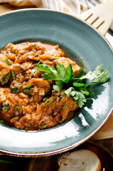 Chakhokhbili. Stewed poultry meat in tomato sauce with spices and garlic