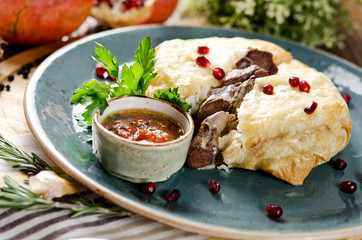 Pilaf in bread with lamb. Traditional Azerbaijani dish