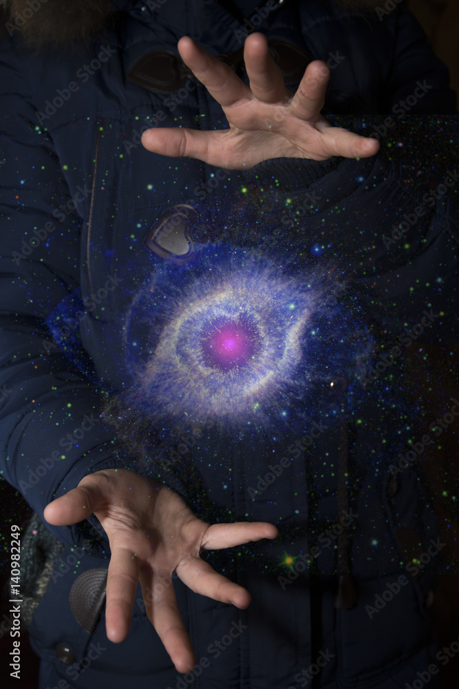Wall mural the vast universe in the hands of a child. elements of this image furnished by nasa.