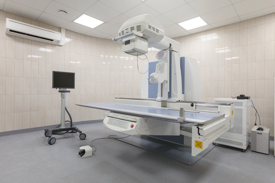 X-ray room in a hospital ER operating room with a classic ceiling-mounted x-ray system