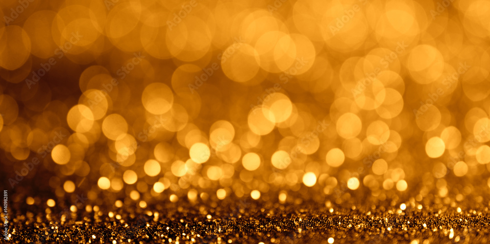 Canvas Prints abstract glitter bokeh light on golden background wide fan page panorama format.
