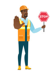 African-american builder holding stop road sign.