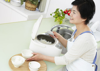 Woman serving rice