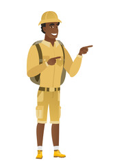 African-american traveler pointing to the side.