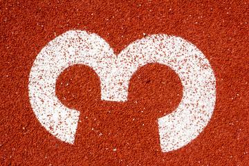 Number three on the start of a running track - check my portfolio for other numbers