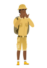 Shoked african-american traveler covering mouth.