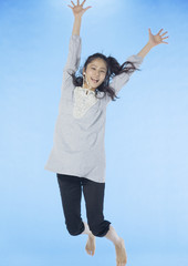 Young woman jumping