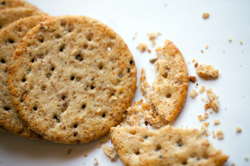 Wholewheat crackers on white background