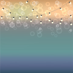 Blurred background with bokeh effect and garland with lamps. Cool template for design, presentations and other documents
