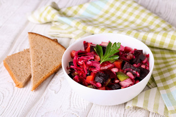 Beet salad Vinaigrette in a white bowl