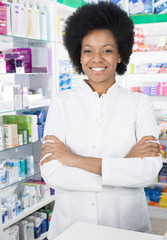 Female Chemist Smiling While Standing Arms Crossed