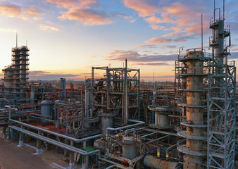 Fototapeta na wymiar Big chemical factory at sunset