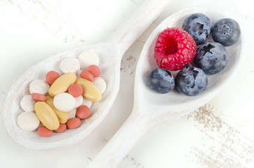 Pills or fresh berries.