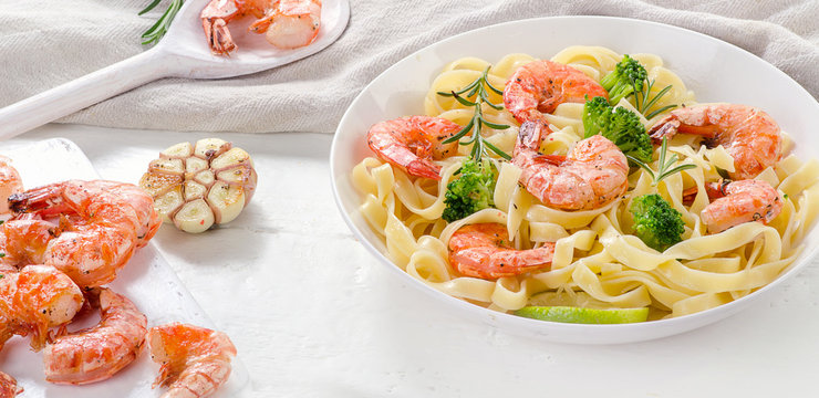 Pasta with shrimps and broccoli. Healthy food concept