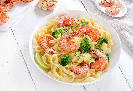 Pasta with shrimps. Healthy diet concept.