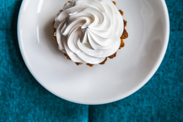 Delicious cake on a blue background