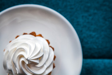 Delicious cake on a blue background